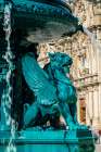 Lions Fountain (Fonte dos Leoes) and the Church of Our Lady of Carmo, Porto, Portugal. Art Print